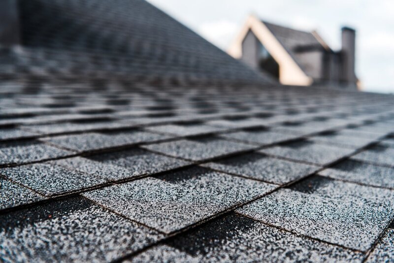 Close-up of asphalt shingle roofing installed on a residential home by Ruff Top Roofing